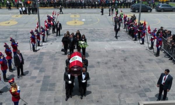 Keiko Fujimori, her brother Kenji, and other relatives follow the coffin of their father, former president Alberto Fujimori, to a museum for his wake in Lima, Peru, on 12 September.