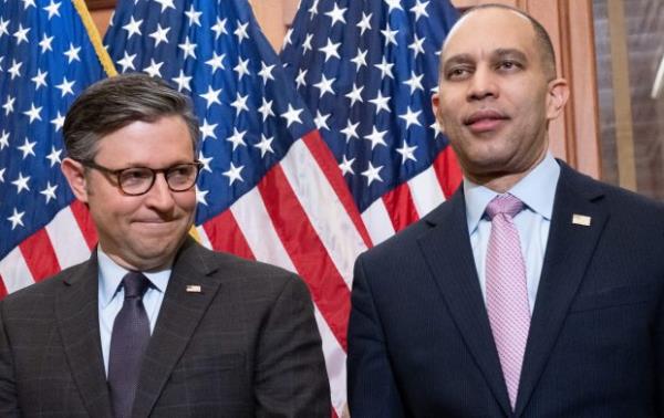 US Speaker of the House Mike Johnson (L), Republican of Louisiana, and US House Democratic Leader Hakeem Jeffries (R), Democrat of New York, look on prior to a meeting with Polish President Andrzej Duda (out of frame) at the US Capitol in Washington, DC, March 12, 2024. (Photo by SAUL LOEB / AFP) (Photo by SAUL LOEB/AFP via Getty Images)